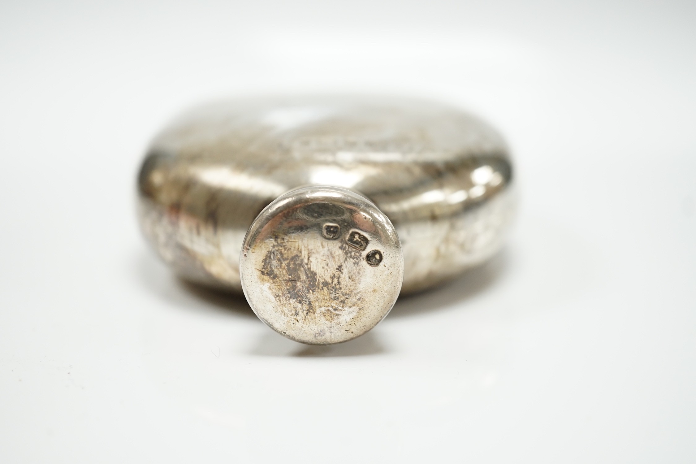 A Victorian silver oval hip flask, Fenton Brothers, Sheffield, 1874, 12.5cm, 6.3oz.